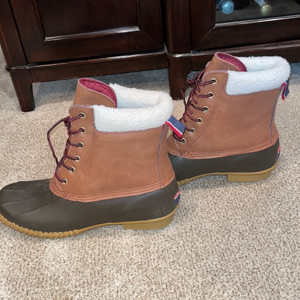 Tommy Hilfiger boots color brown. Brand new. Never worn.